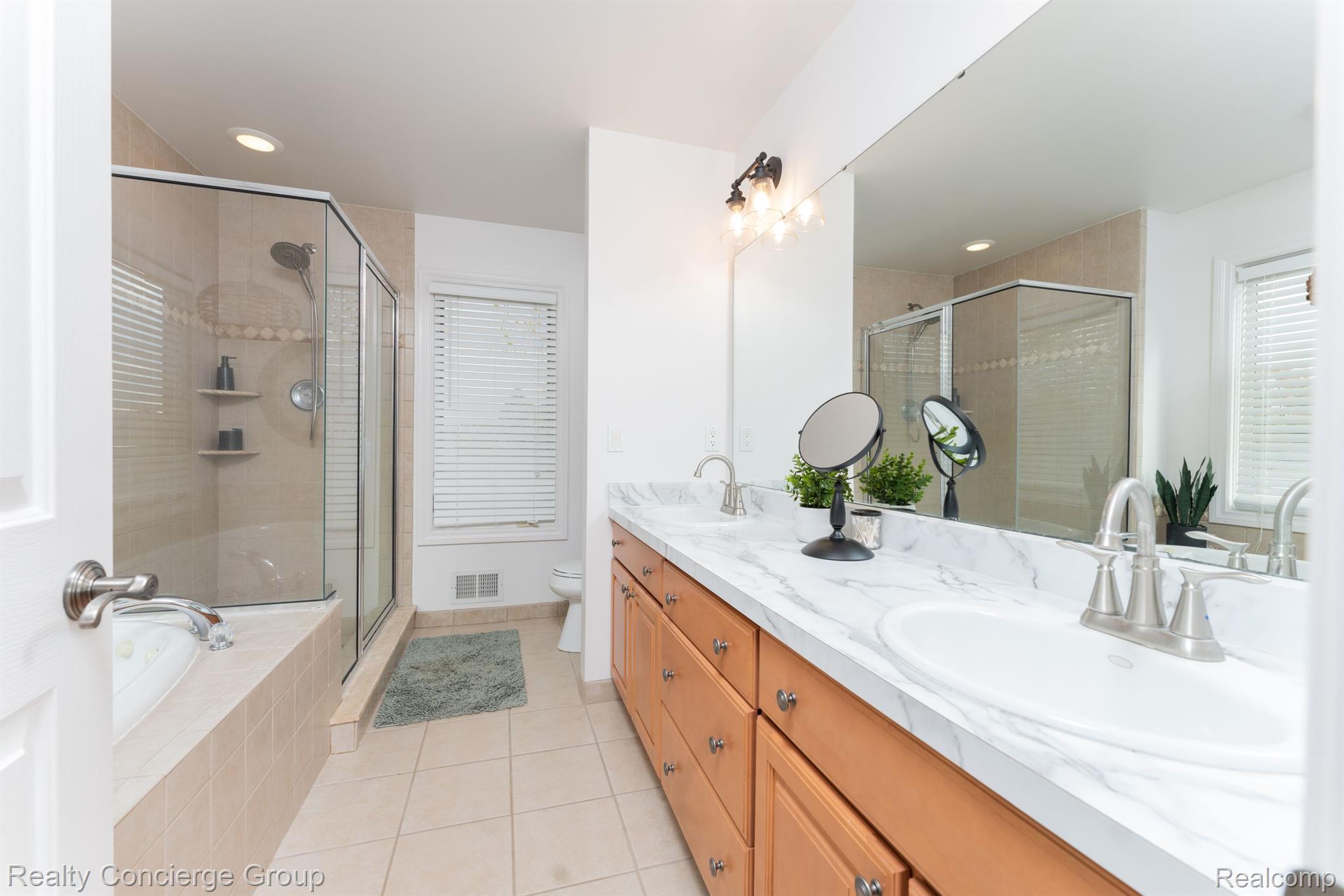 1172 Thorn Ridge Drive Howell, MI 48843 - Photo 26 of 71 Master bath w/ dbl sinks, vanity, glass shower