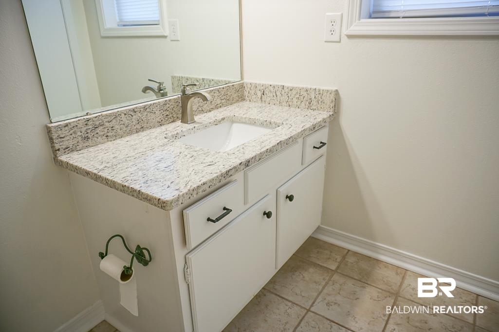 4377 Fathbrook Lane Mobile, AL 36693 - Photo 13 of 19 Bathroom featuring baseboards and vanity