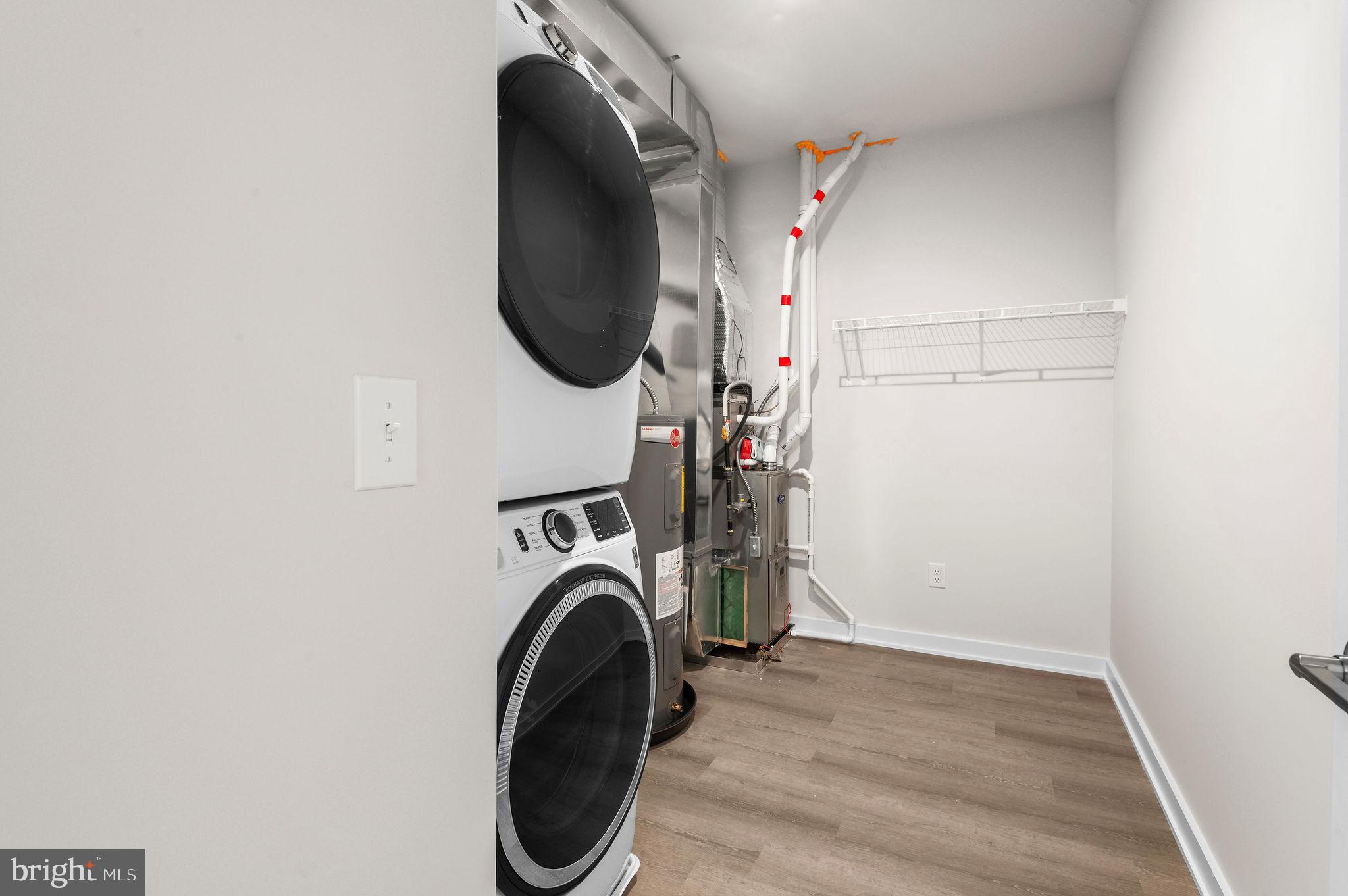 26 South York Road, Unit 208 Hatboro, PA 19040 - Photo 12 of 52 a utility room with dryer and washer