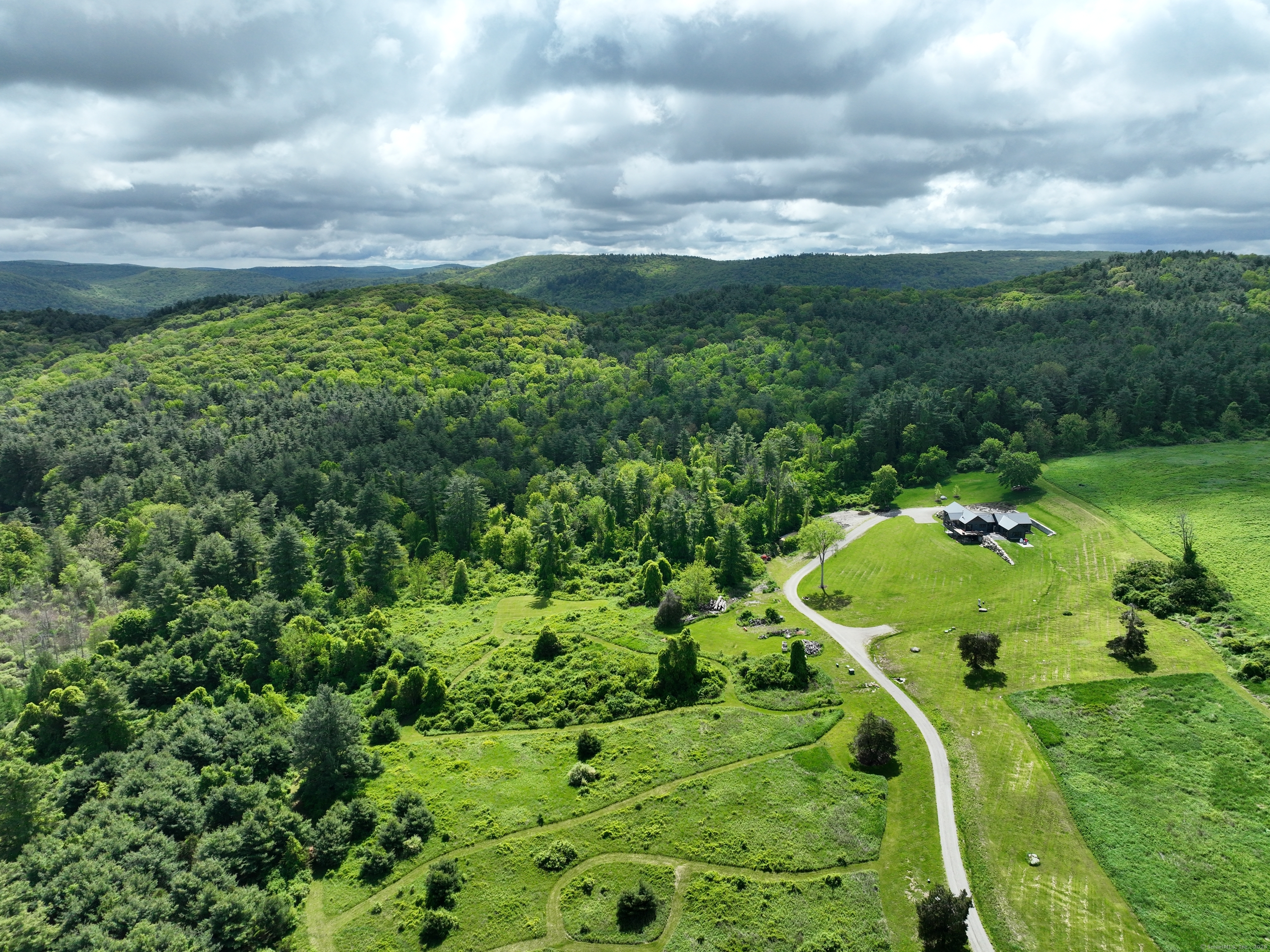 10 Red Mountain Road Salisbury, CT 06039 - Photo 3 of 7 a view of a garden with an outdoor space