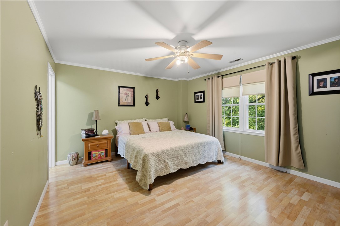 2001 Ridgeview Lane Seneca, SC 29678 - Photo 21 of 27 A restful bedroom offers bright windows and light-toned flooring under a functional ceiling fan.
