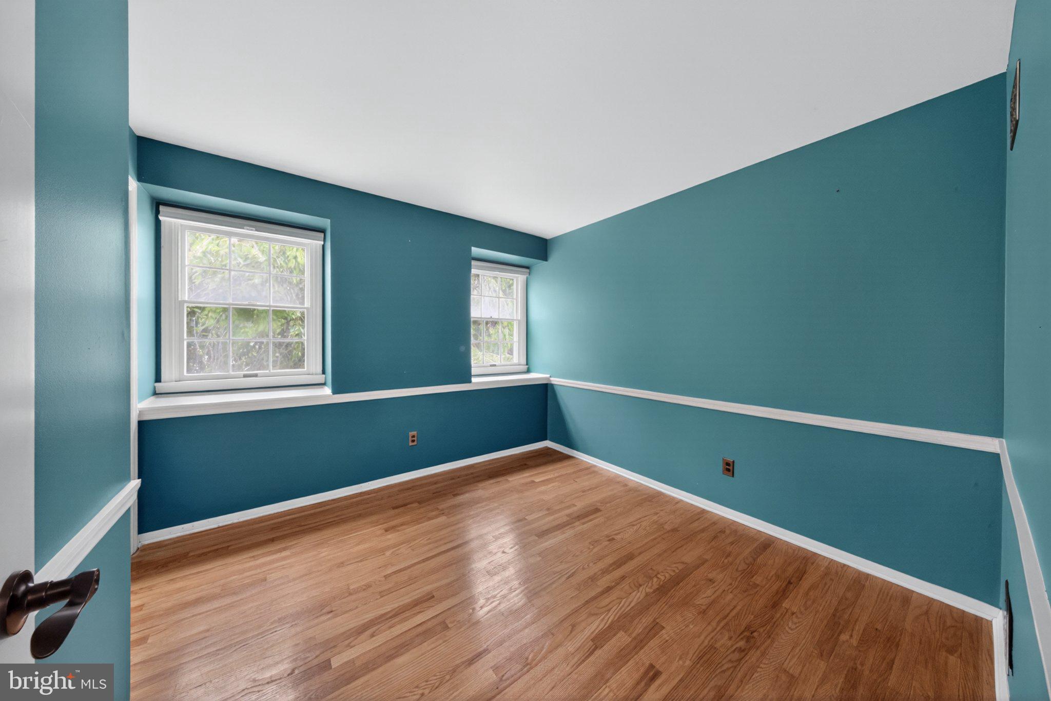 1020 Jeffrey Road Wilmington, DE 19810 - Photo 60 of 108 Bright, serene teal room with windows.