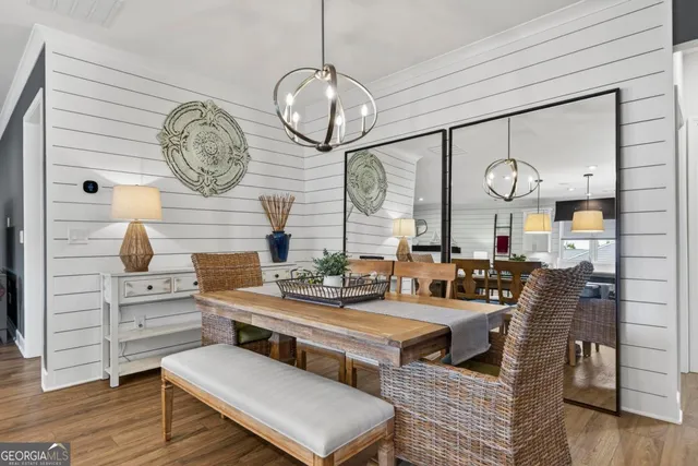 a room with wooden furniture and wooden floor