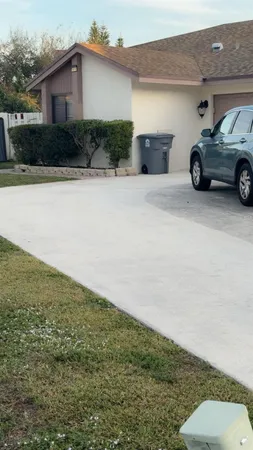 a car parked in front of a house