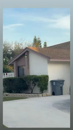 a view of a back yard of the house