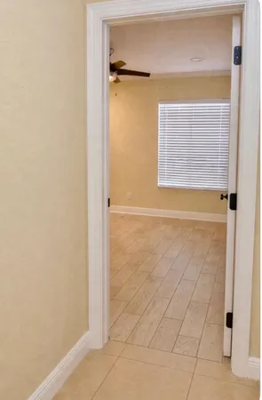 a view of a hallway view with staircase