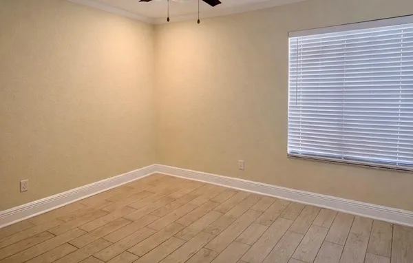 a view of a hallway with closet area