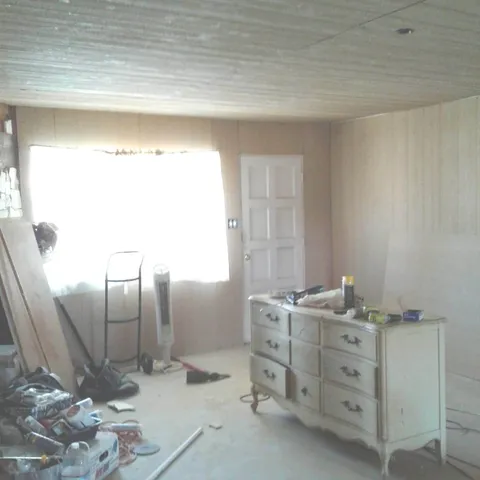 a living room with a fireplace