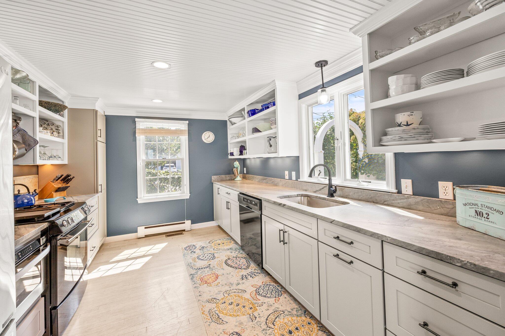 80 Hiram Pond Road Dennis, MA 02638 - Photo 12 of 82 a spacious bathroom with a granite countertop sink mirror and