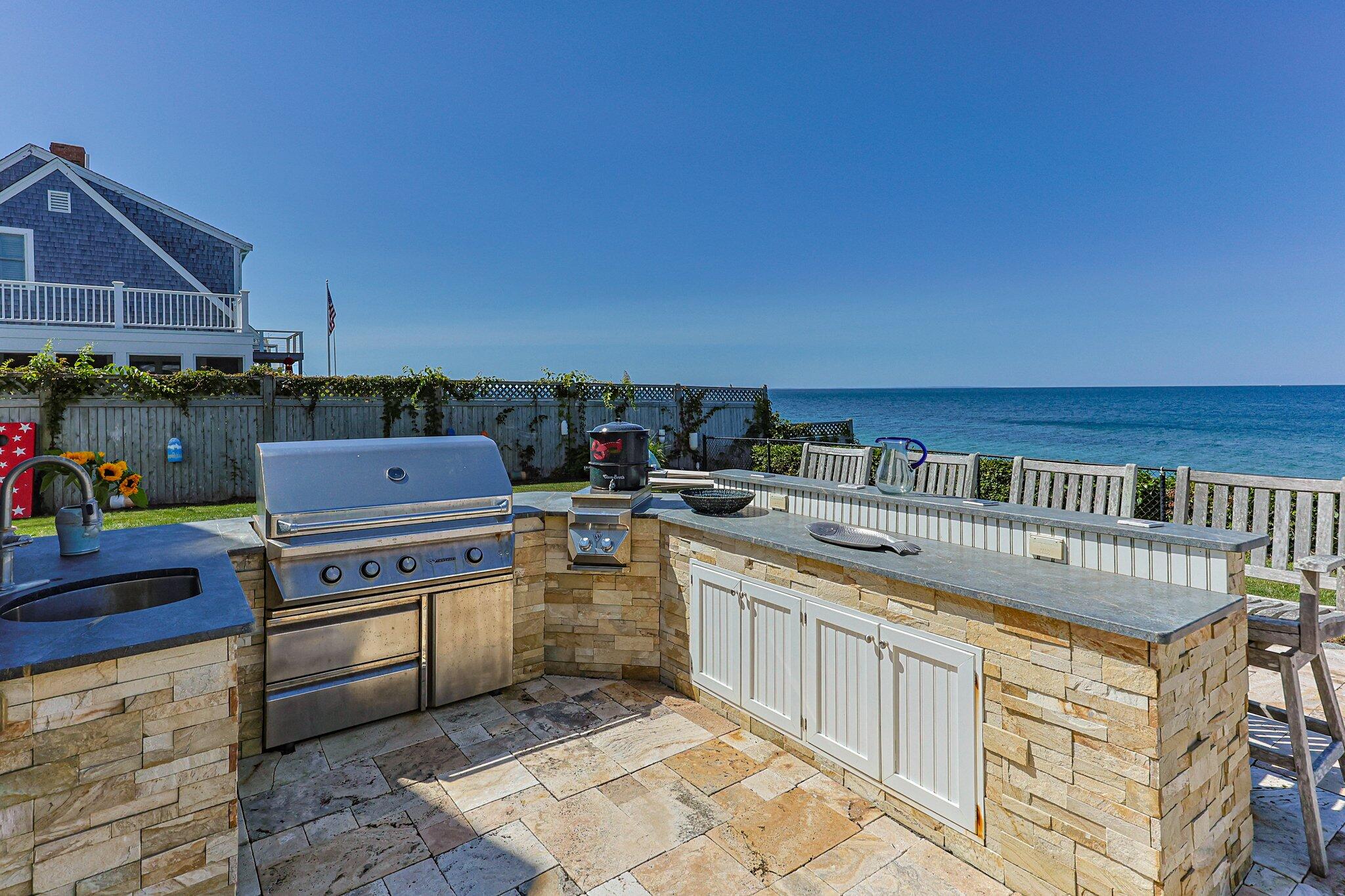 80 Hiram Pond Road Dennis, MA 02638 - Photo 48 of 82 a view of a kitchen with a stove