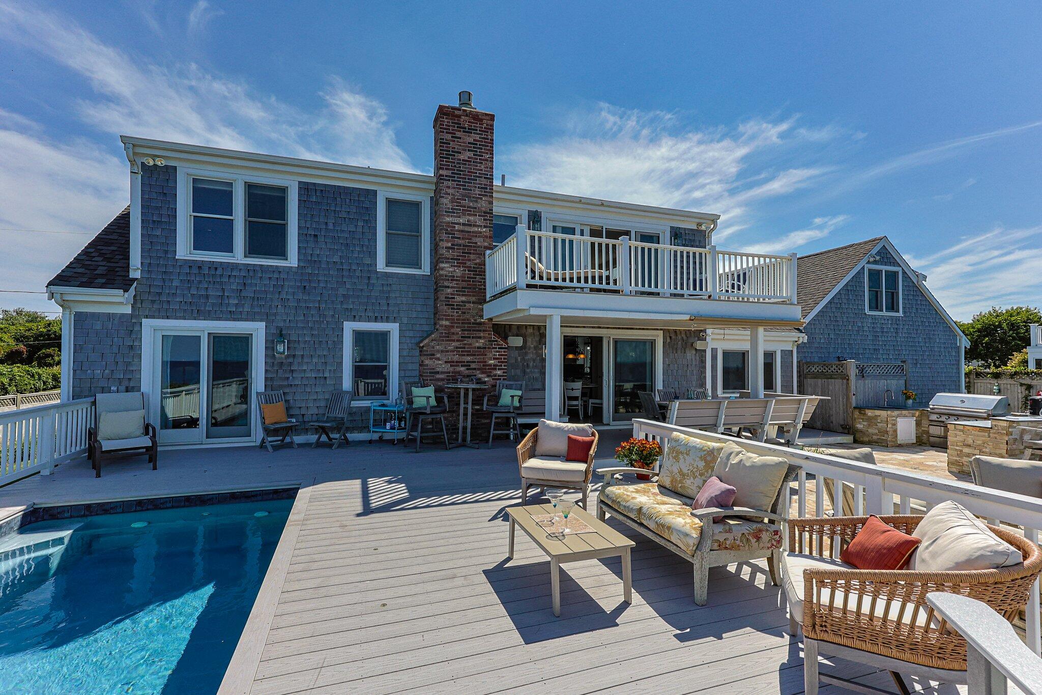 80 Hiram Pond Road Dennis, MA 02638 - Photo 54 of 82 a outdoor space with a couch and wooden floor