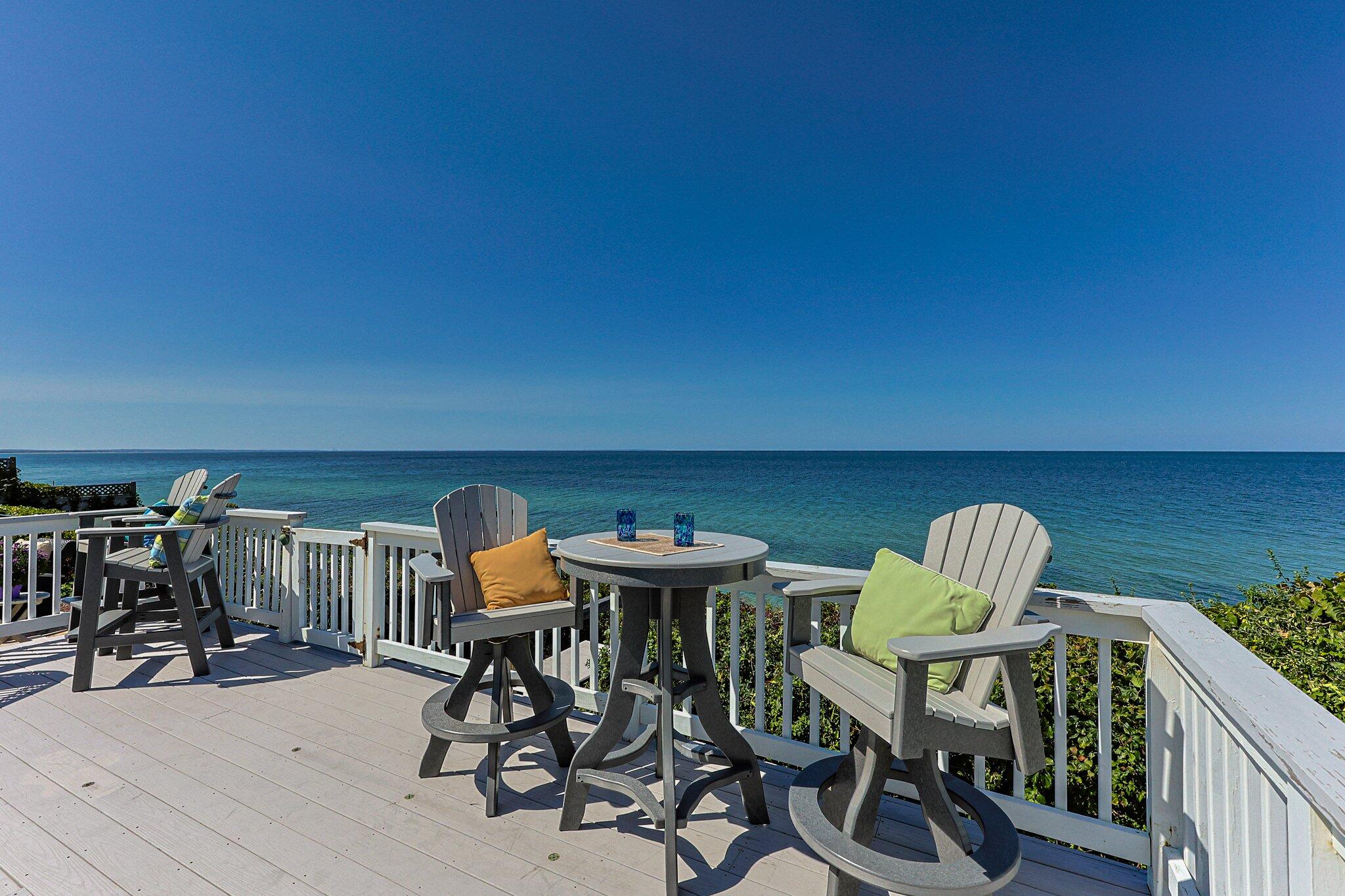 80 Hiram Pond Road Dennis, MA 02638 - Photo 55 of 82 a view of a chairs and table in patio