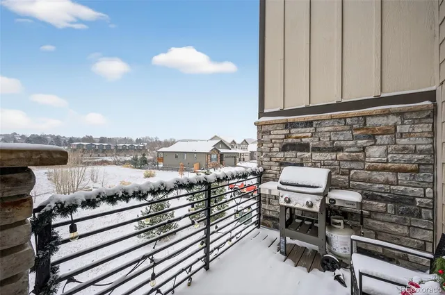a view of a terrace with seating area
