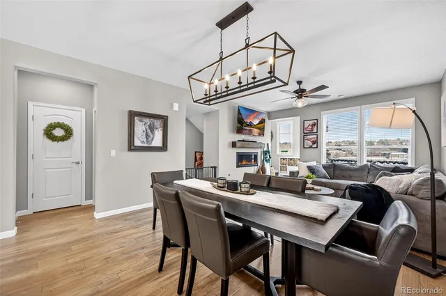 a view of a dining room with furniture window and outside view