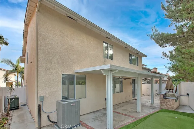 a view of a back yard of the house