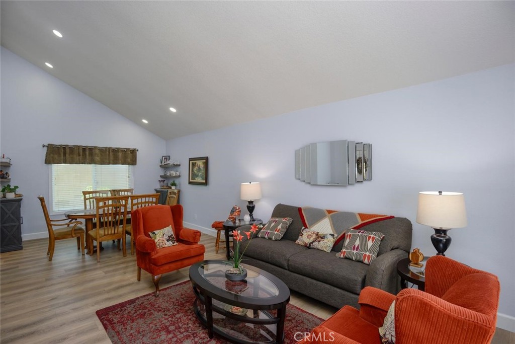 10424 Cartilla Court Rancho Cucamonga, CA 91737 - Photo 4 of 36 a living room with furniture and wooden floor