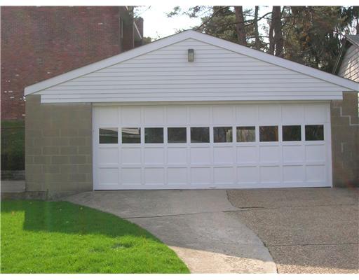 1143 Trion Road Pittsburgh, PA 15237 - Photo 2 of 14 Parking Lot/Garage. The two car garage with an automatic opener and a man door on the left side, is extra large with plenty of space for a workbench as well as a mower and all the necessary yard equipment.
