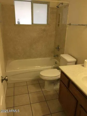 a bathroom with a sink a toilet and a bathtub