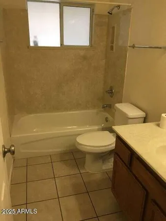 a bathroom with a sink a toilet and a bathtub