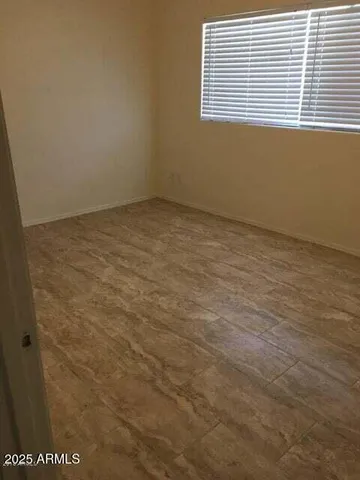 a view of a room that has a window in it