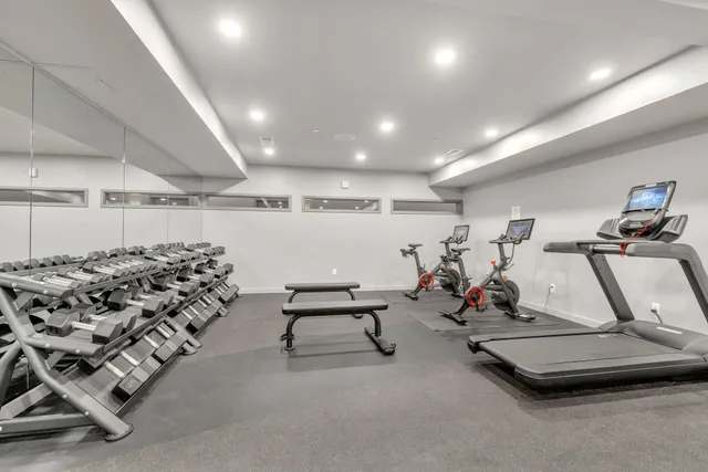 a view of a patio with swimming pool table and chairs