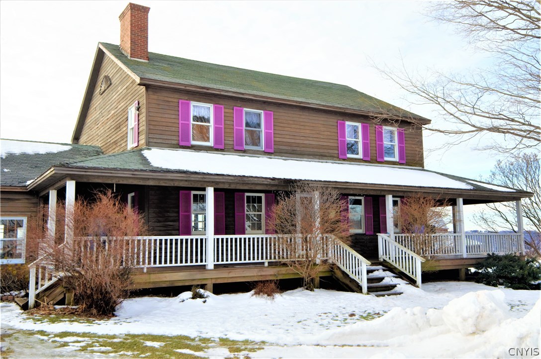 4709 Roberts Road Fenner, NY 13035 - Photo 1 of 1 Front porch view showcasing wrap around porch