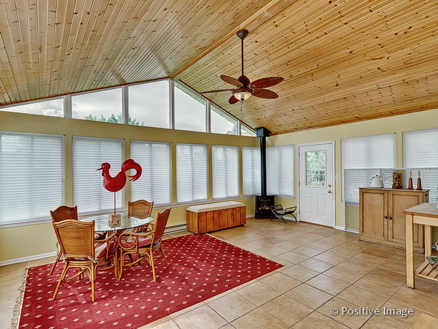 1463 Saddleridge Place Bartlett, IL 60103 - Photo 8 of 27 a view of a dining room with furniture