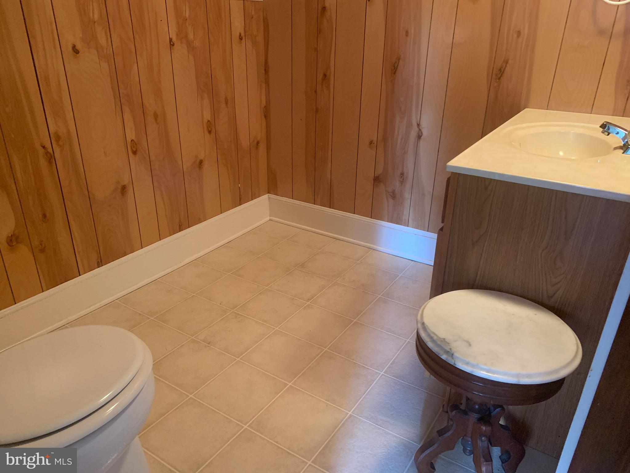 6205 Rock Hall Road Rock Hall, MD 21661 - Photo 16 of 17 Half bath on 2nd floor