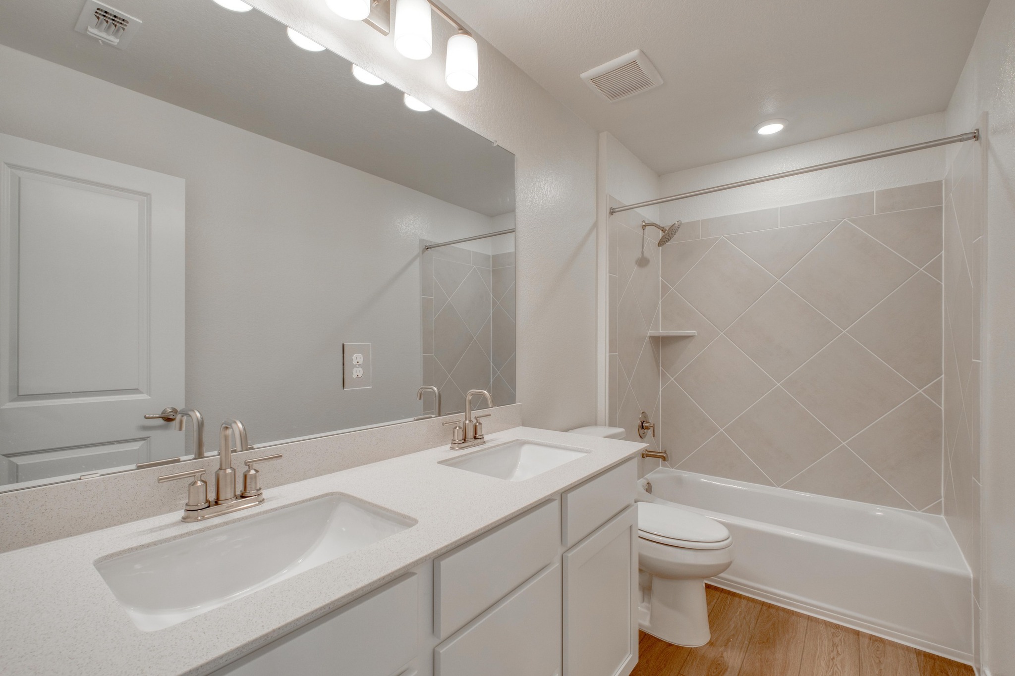 4608 Centola Loop Round Rock, TX 78665 - Photo 28 of 33 a bathroom with a sink a toilet and shower