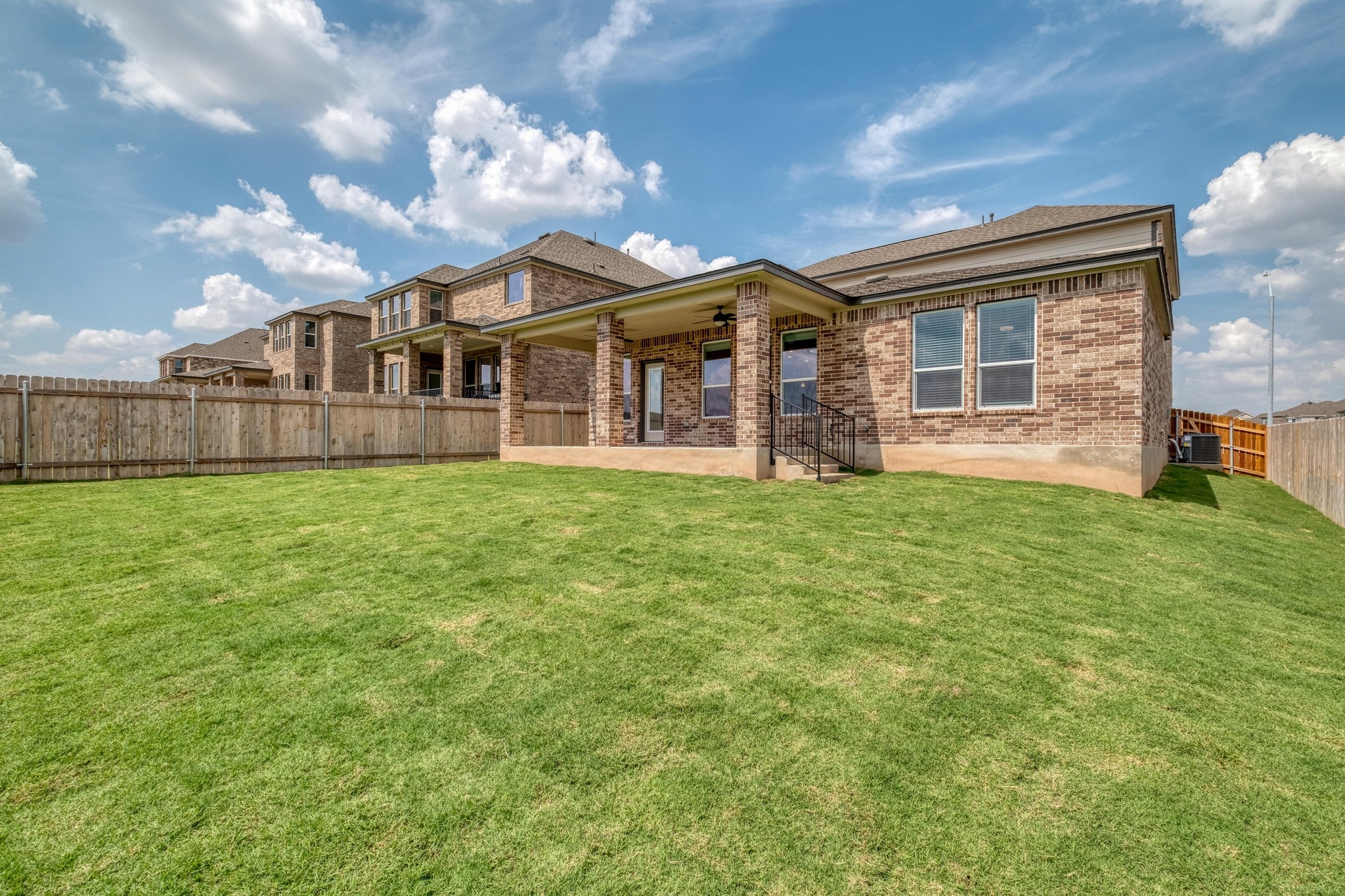 4608 Centola Loop Round Rock, TX 78665 - Photo 30 of 33 a view of a house with a yard and pathway