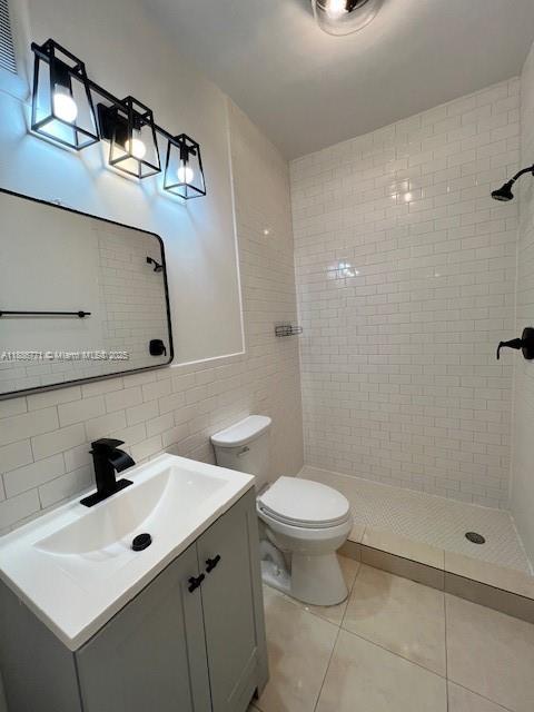 1000 Southwest 12th Court, Unit 4 Miami, FL 33135 - Photo 16 of 21 a bathroom with a sink toilet and shower