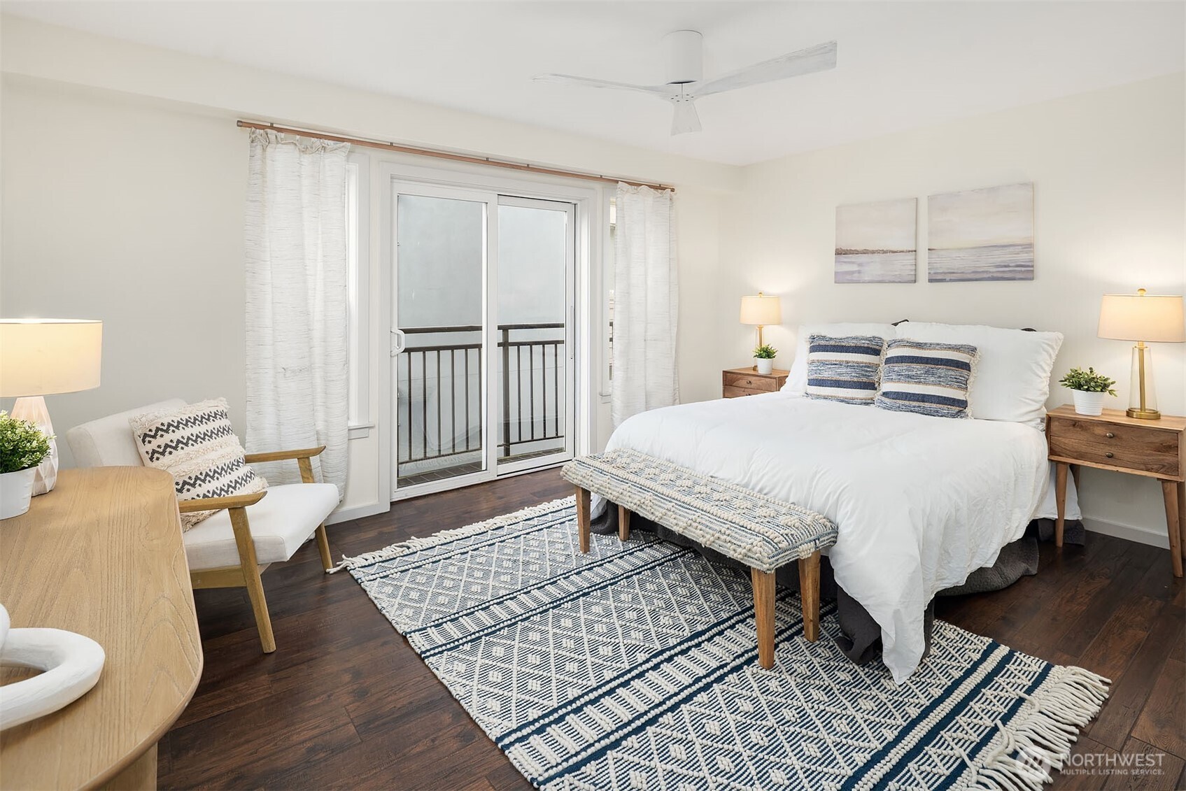 500 Aloha Street, Unit E307 Seattle, WA 98109 - Photo 17 of 28 a bed room with a bed and a chair