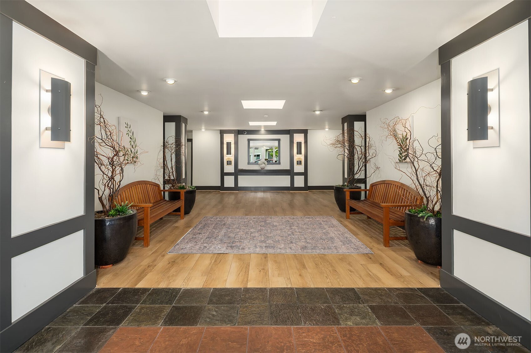 500 Aloha Street, Unit E307 Seattle, WA 98109 - Photo 2 of 28 a living room with furniture
