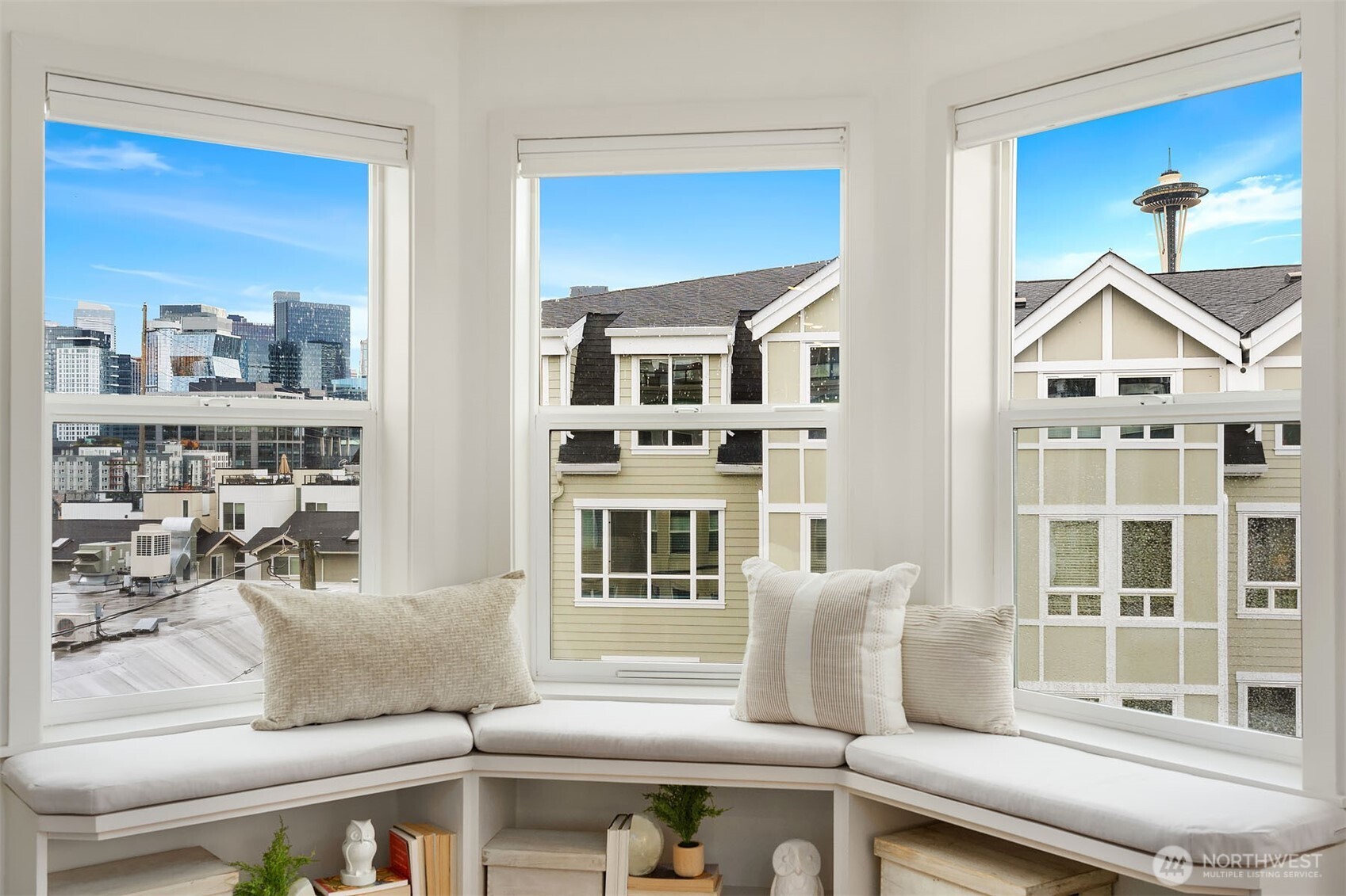 500 Aloha Street, Unit E307 Seattle, WA 98109 - Photo 7 of 28 a living room with furniture and a window