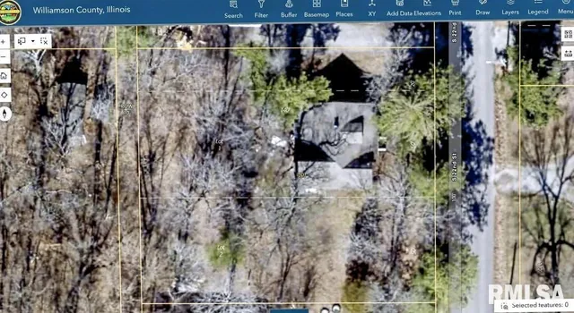 a view of open water with a building in background