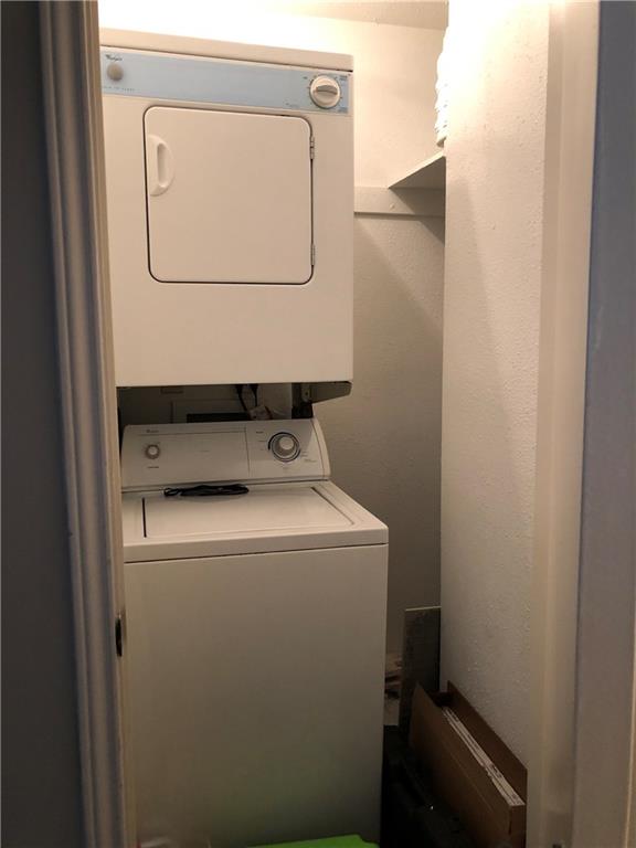203 East 31st Street, Unit 103 Austin, TX 78705 - Photo 28 of 32 a utility room with dryer and washer
