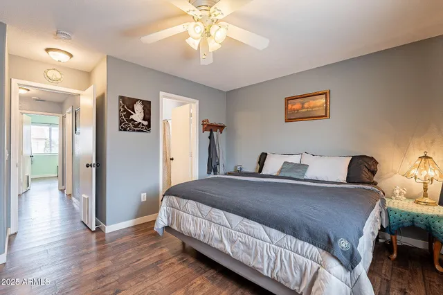 a kitchen that has a sink and a stove top oven