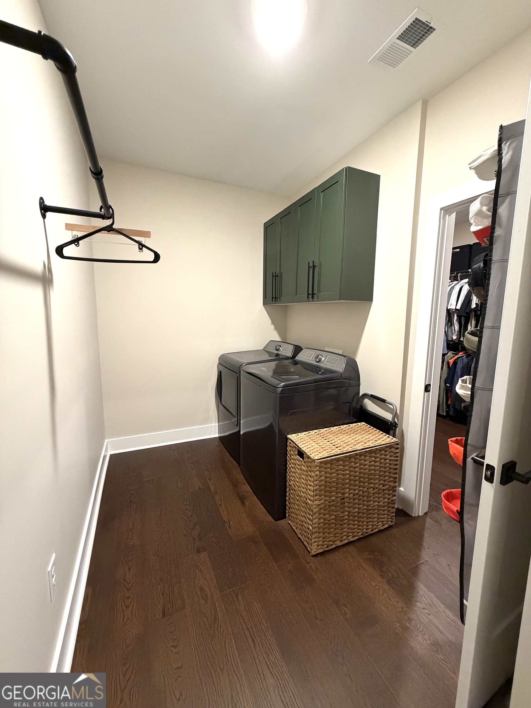 3050 Mahlon Smith Road Social Circle, GA 30025 - Photo 25 of 37 a living room with furniture and a flat screen tv
