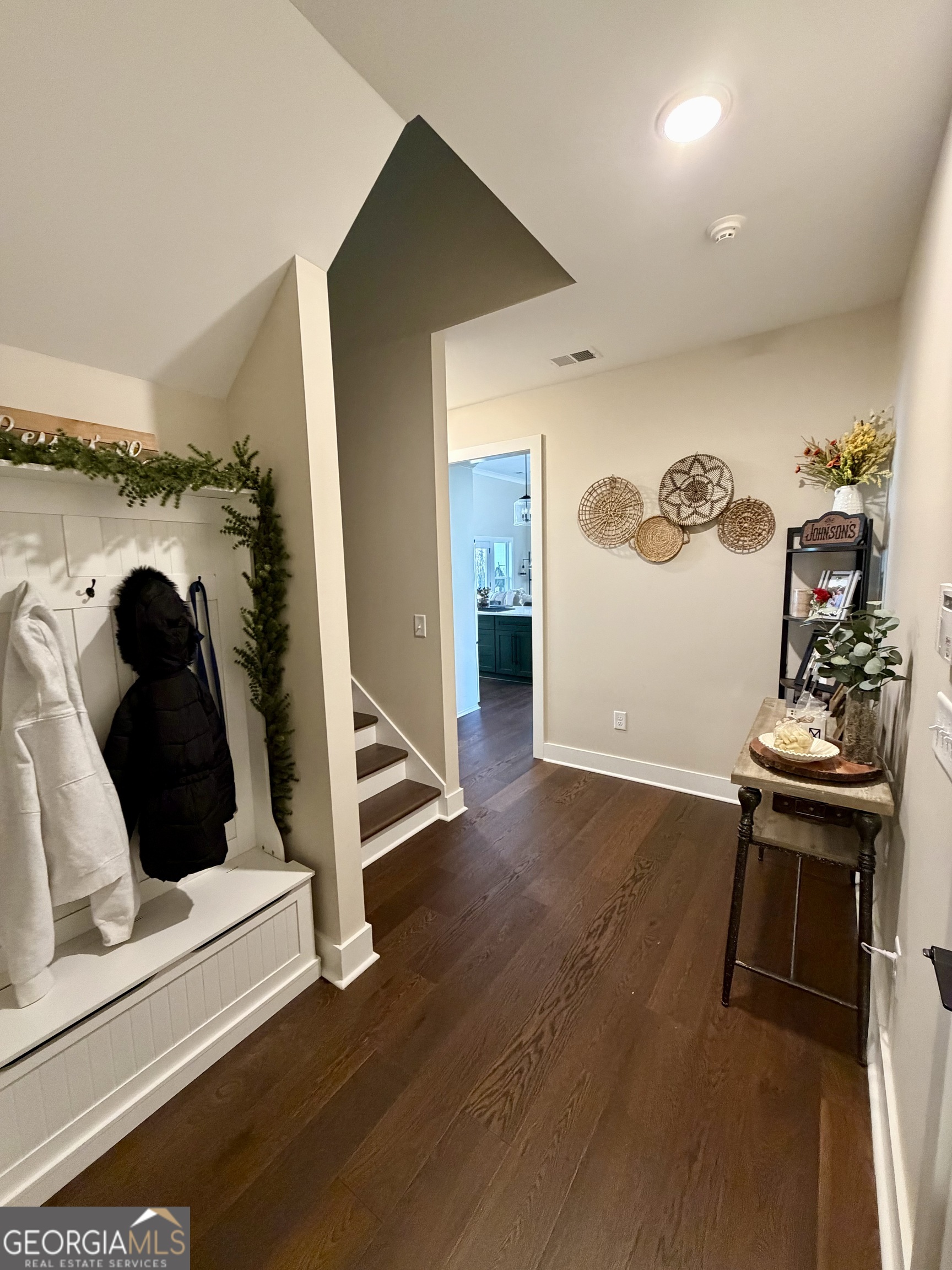 3050 Mahlon Smith Road Social Circle, GA 30025 - Photo 26 of 37 a view of walk in closet with clothes and shoes