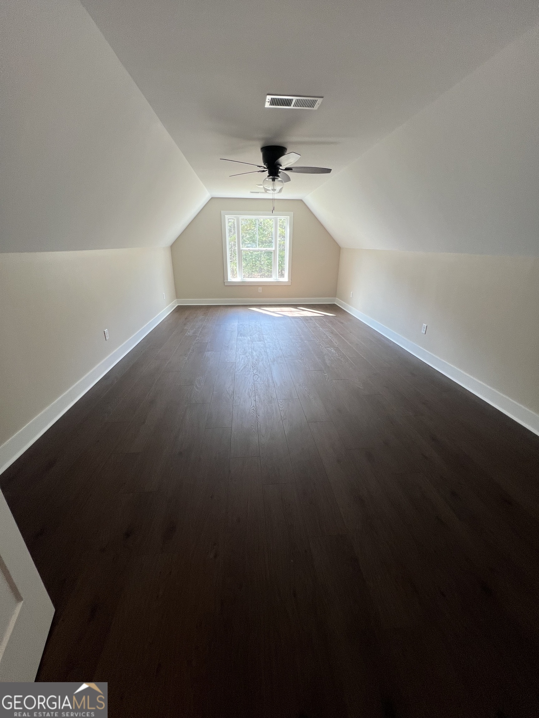 3050 Mahlon Smith Road Social Circle, GA 30025 - Photo 28 of 37 a view of an empty room with a window