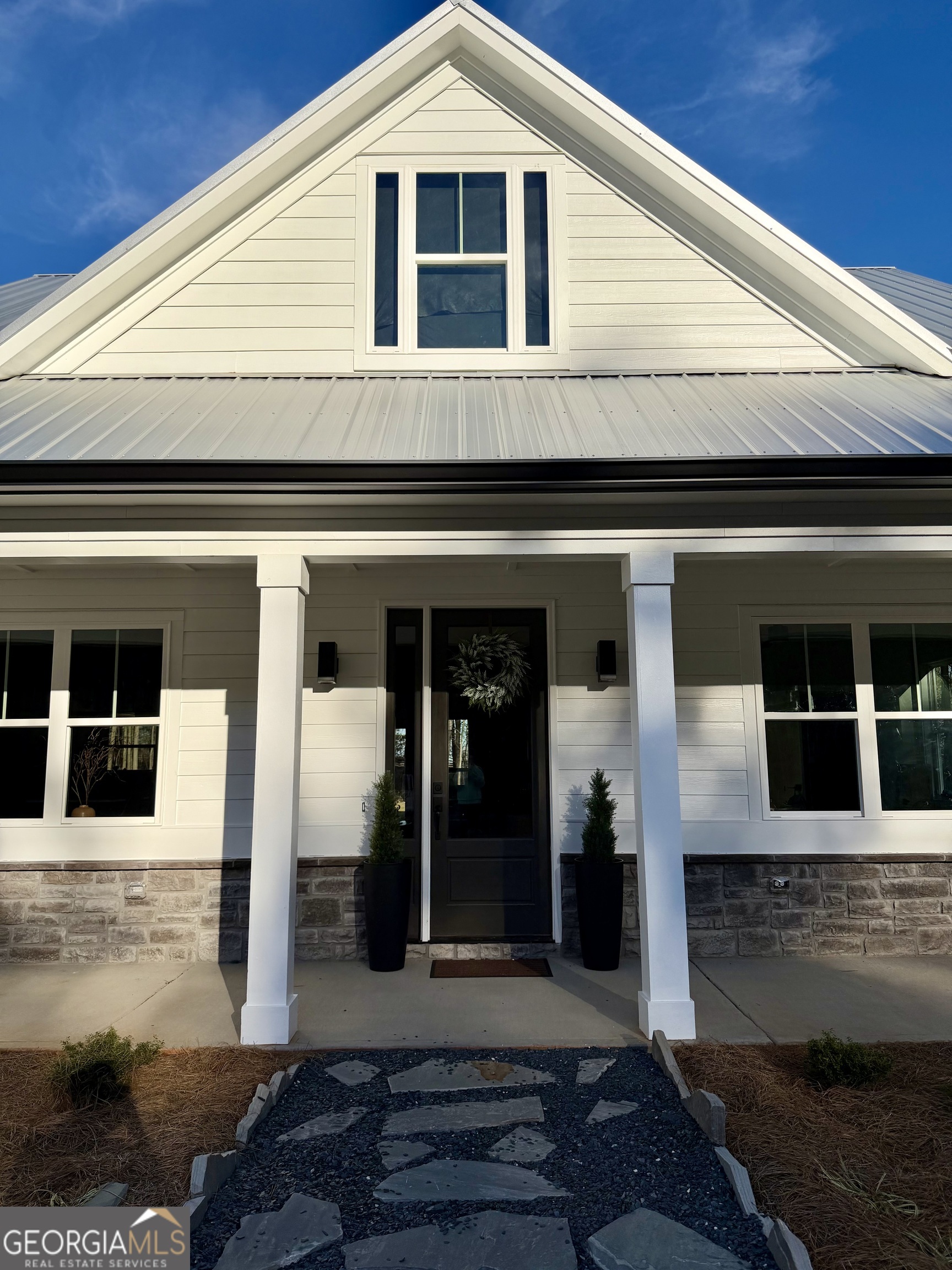 3050 Mahlon Smith Road Social Circle, GA 30025 - Photo 3 of 37 a front view of a house
