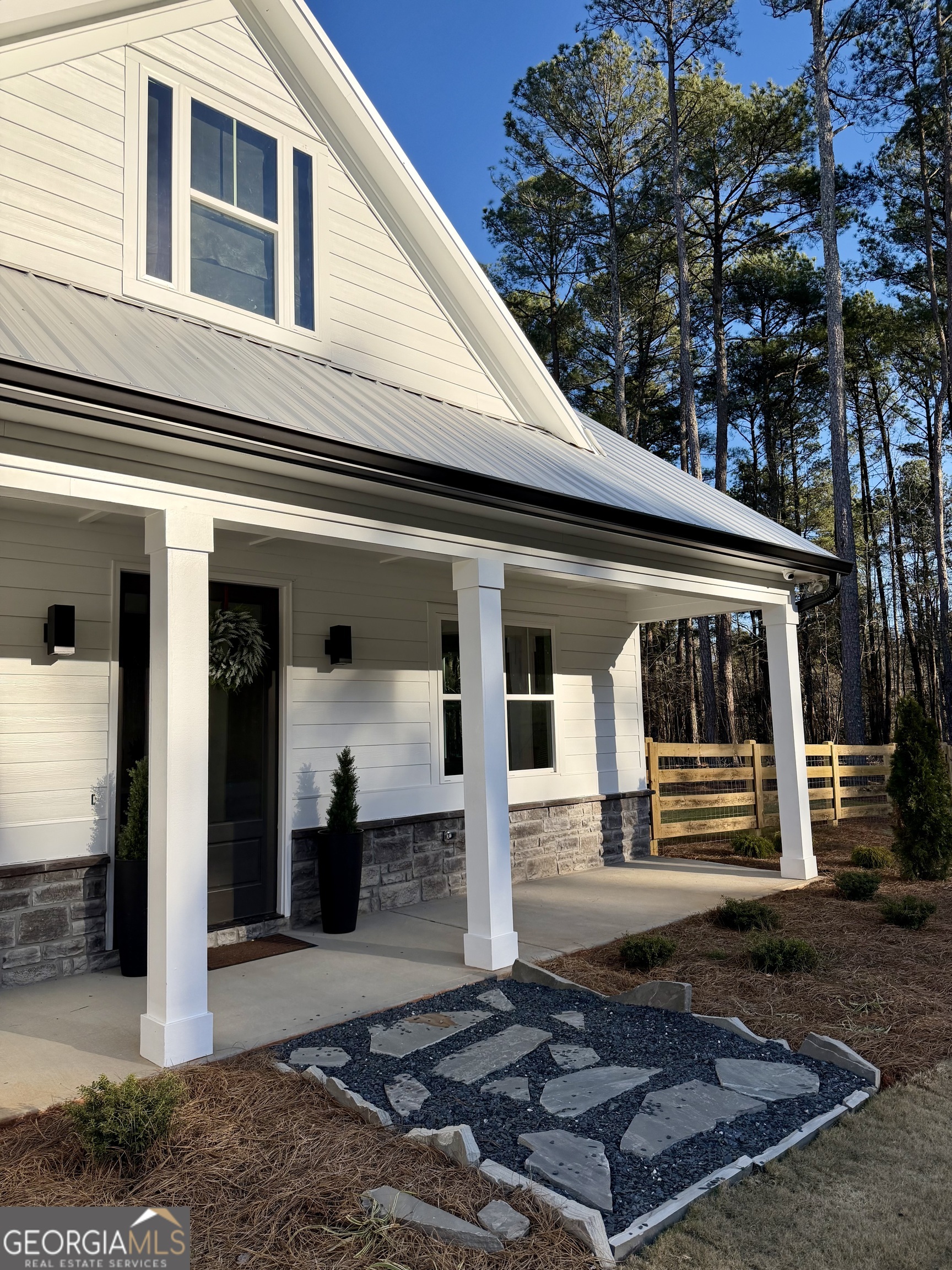 3050 Mahlon Smith Road Social Circle, GA 30025 - Photo 4 of 37 a front view of a house