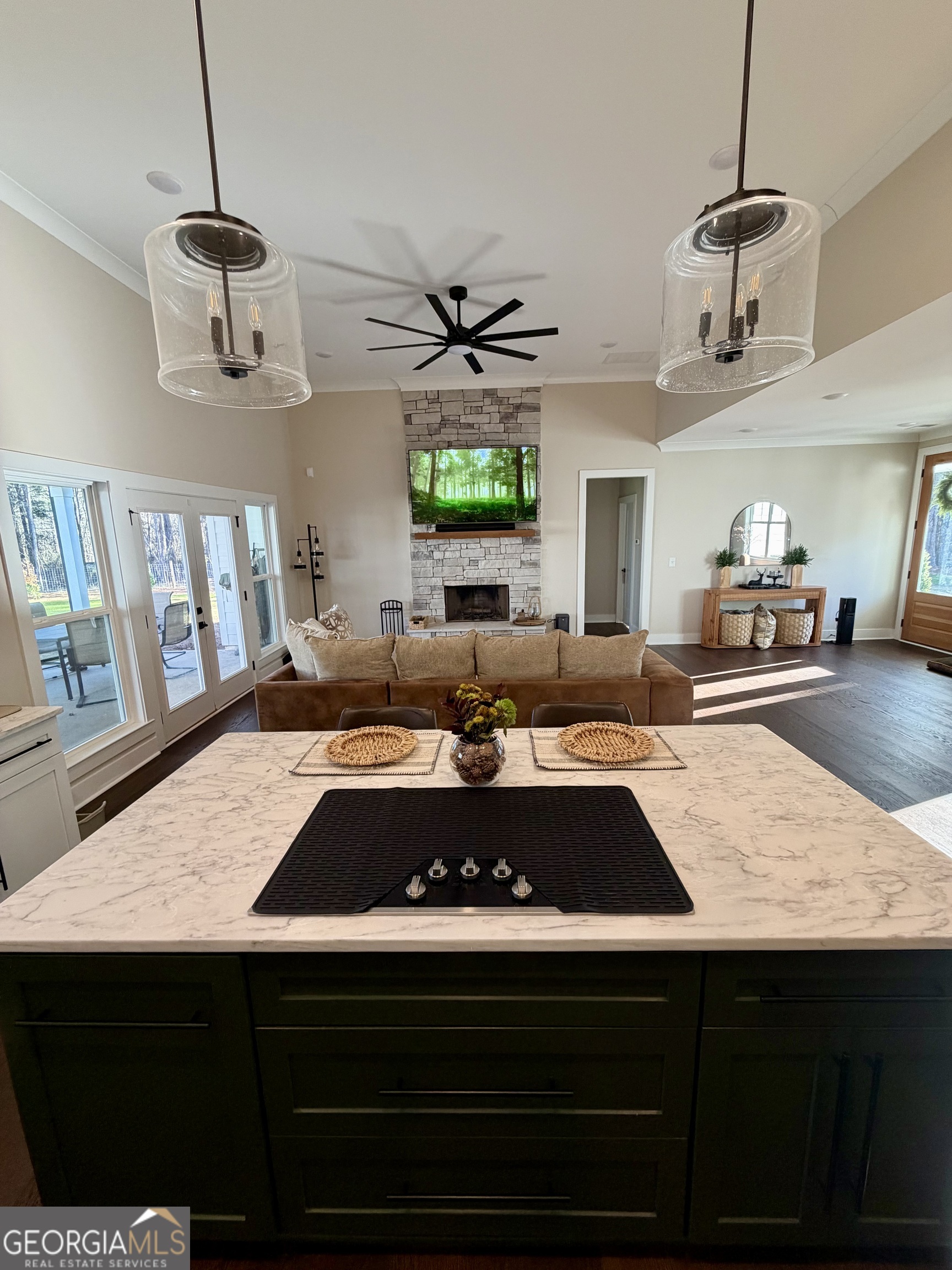 3050 Mahlon Smith Road Social Circle, GA 30025 - Photo 10 of 37 a kitchen with a table chairs and a window