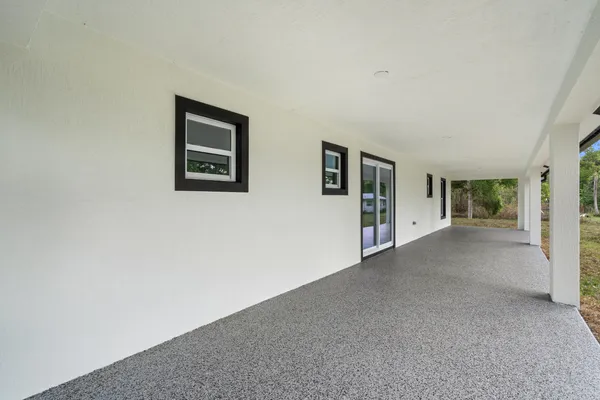 a view of a house with a ceiling fan