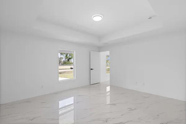 an empty room with windows