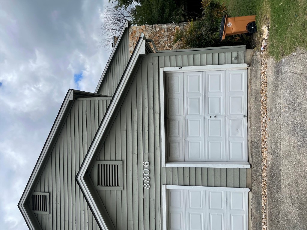 8806 Schick Road, Unit A Austin, TX 78729 - Photo 1 of 13 a front view of a house