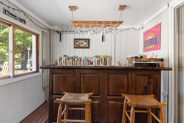 a view of a room with furniture window and wooden floor