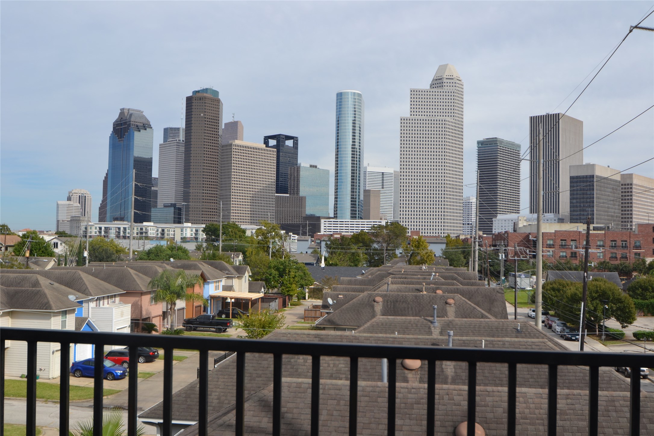 1316 Cleveland Street, Unit C Houston, TX 77019 - Photo 1 of 38 a view of a city with tall buildings