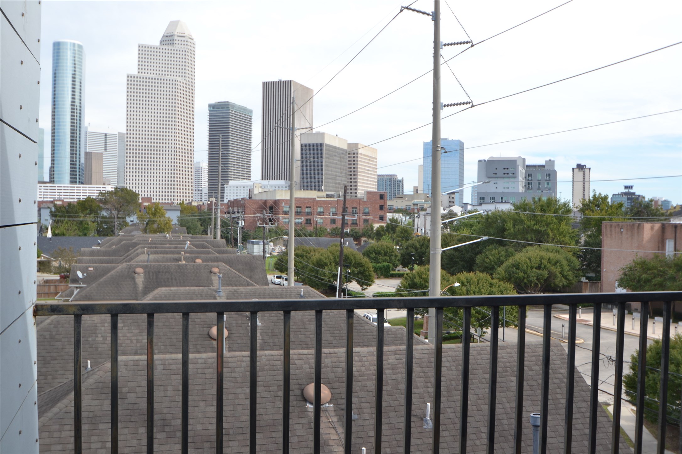 1316 Cleveland Street, Unit C Houston, TX 77019 - Photo 23 of 38 a view of city from a balcony