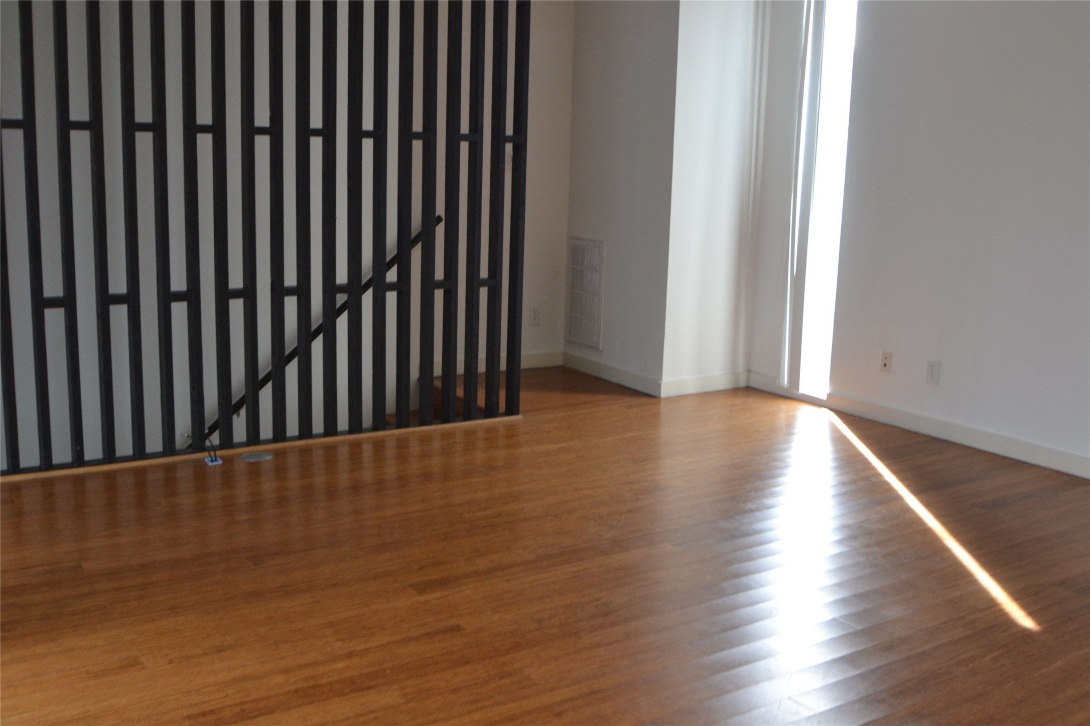 1316 Cleveland Street, Unit C Houston, TX 77019 - Photo 7 of 38 a view of wooden floor